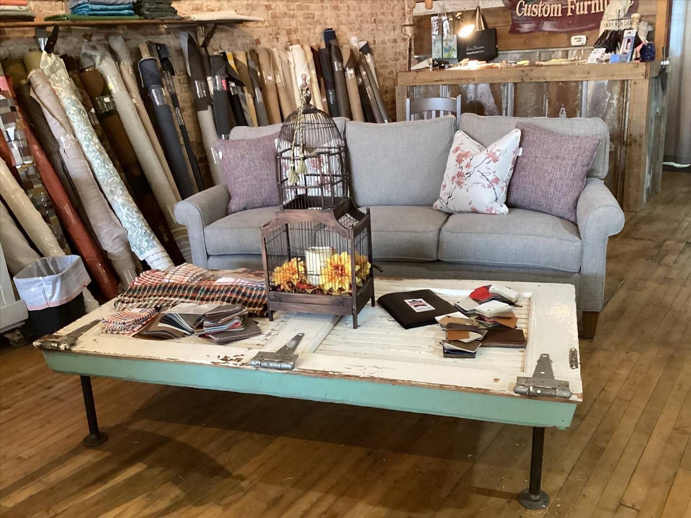 A couch is sitting in a room.