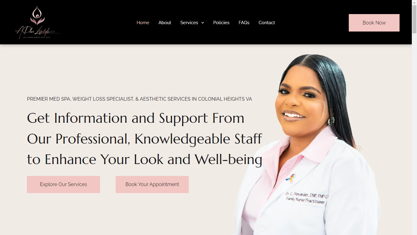 A woman in a lab coat is standing in front of a website.