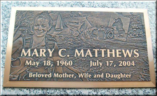 A bronze grave marker for mary c. matthews