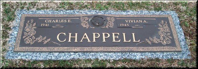 A grave marker for charles and viviana chappelle