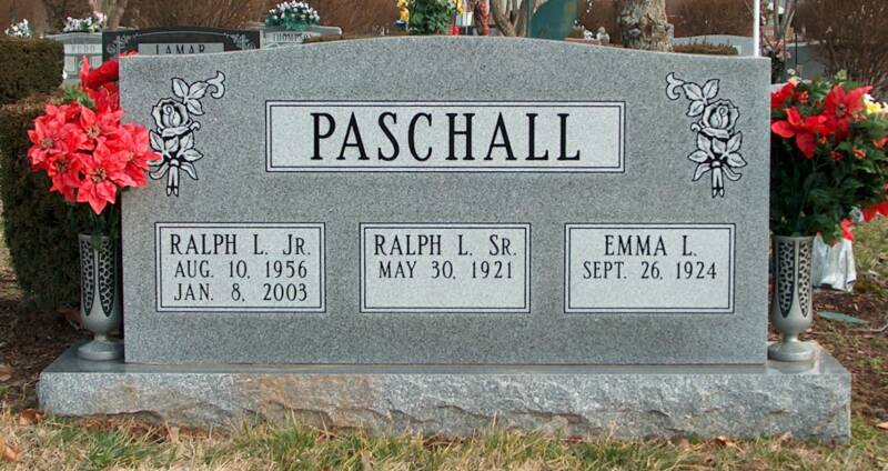 A gravestone with the name paschall on it