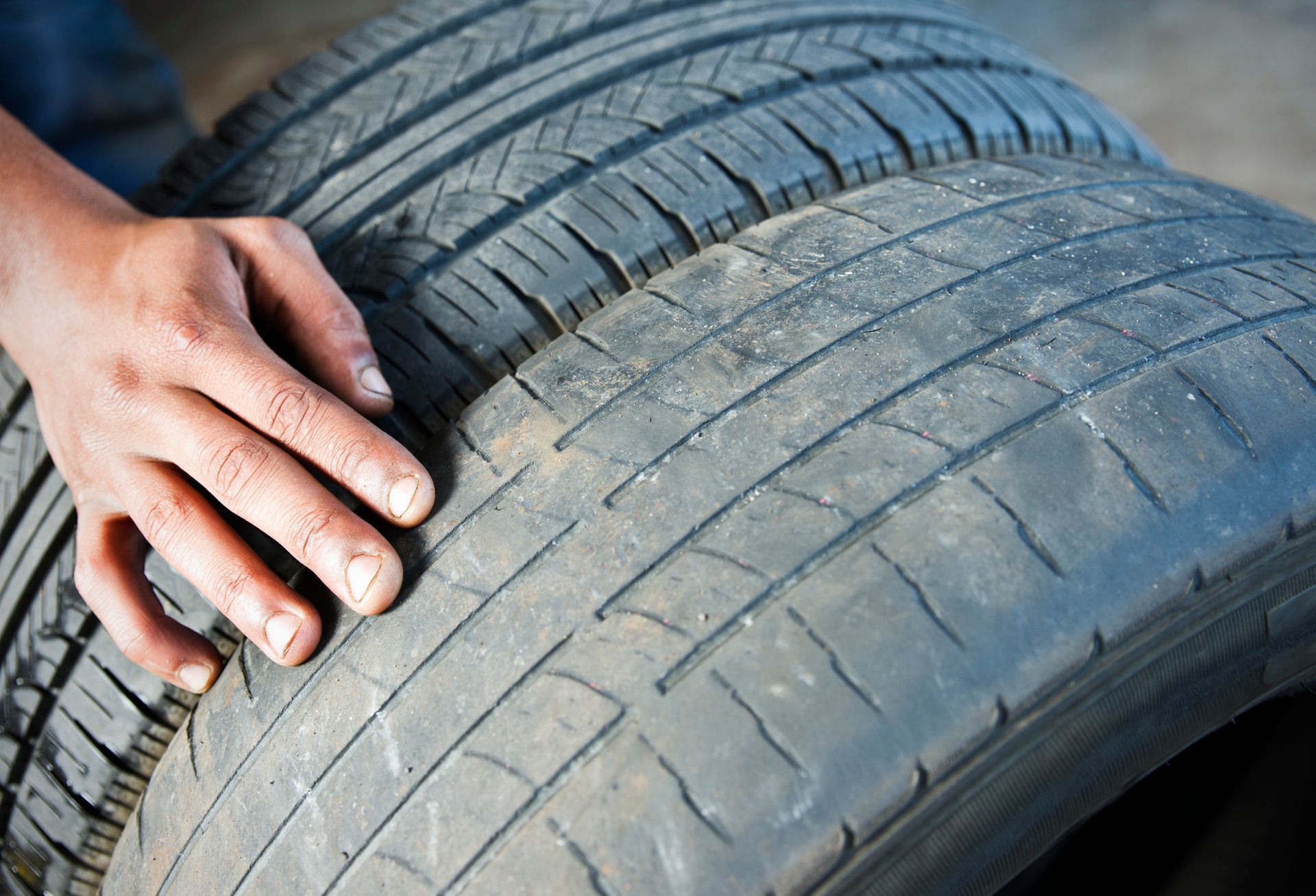 Photo Of Hand And Tires — Hammond, IN — Still Hookin Towing And Hauling LLC