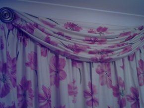 Flower patterned curtains.