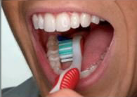 Step 3 of brushing your teeth — Dentist in Tampa, FL