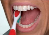 Step 4 of brushing your teeth — Dentist in Tampa, FL