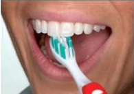 Step 5 of brushing your teeth — Dentist in Tampa, FL