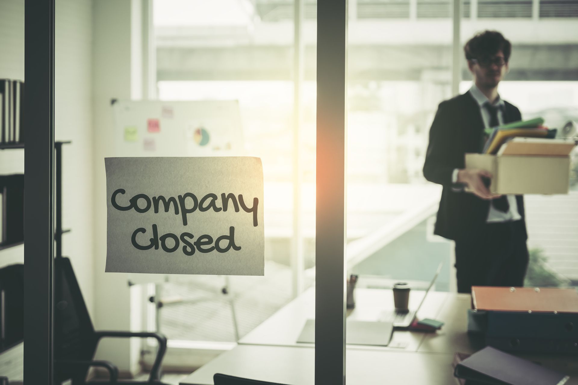 The company closed on windows of an empty office with a businessman. The company closed on windows of an empty office with a businessman.