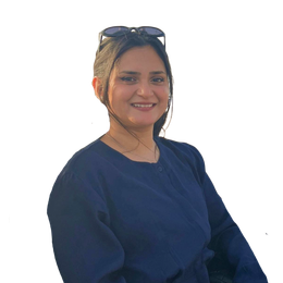 Woman smiling, wearing dark blue top, sunglasses on head, white background.