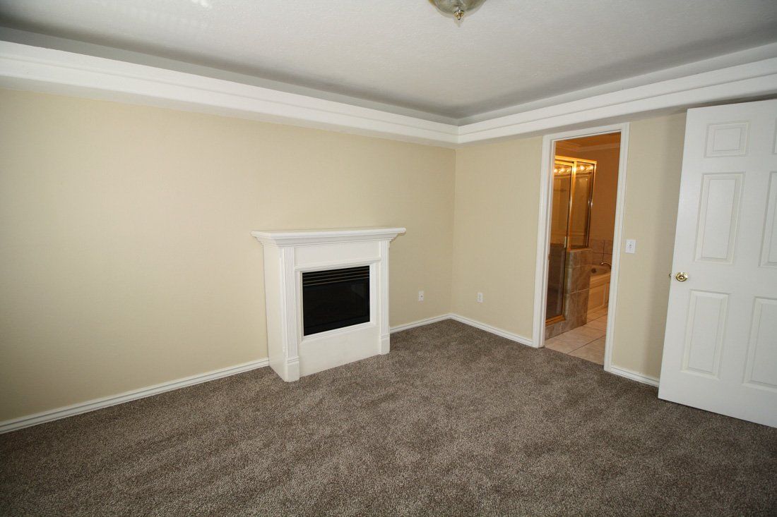 Asbury Place Condominium Living Room with Fireplace | Desert Crest LLC