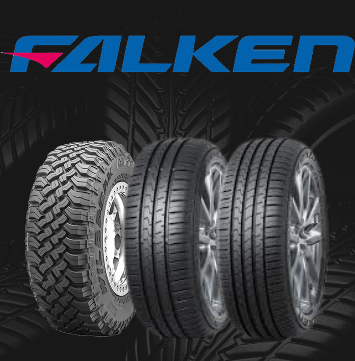 A car tire splashes through a puddle on a dark, wet road, highlighting the tread and water spray.