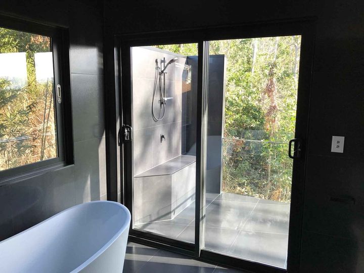 Bathroom with Sliding Door —  Plumber in the Whitsundays Cannonmvale, QLD