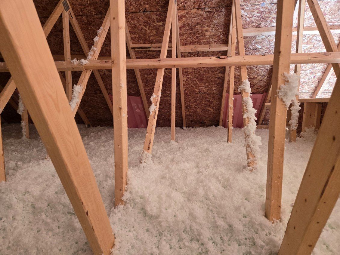There is a lot of insulation in the attic of a house under construction.