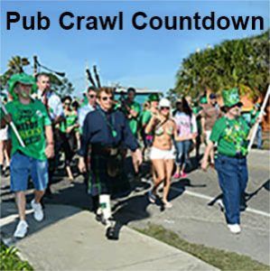 A group of people are walking down a sidewalk in a parade.