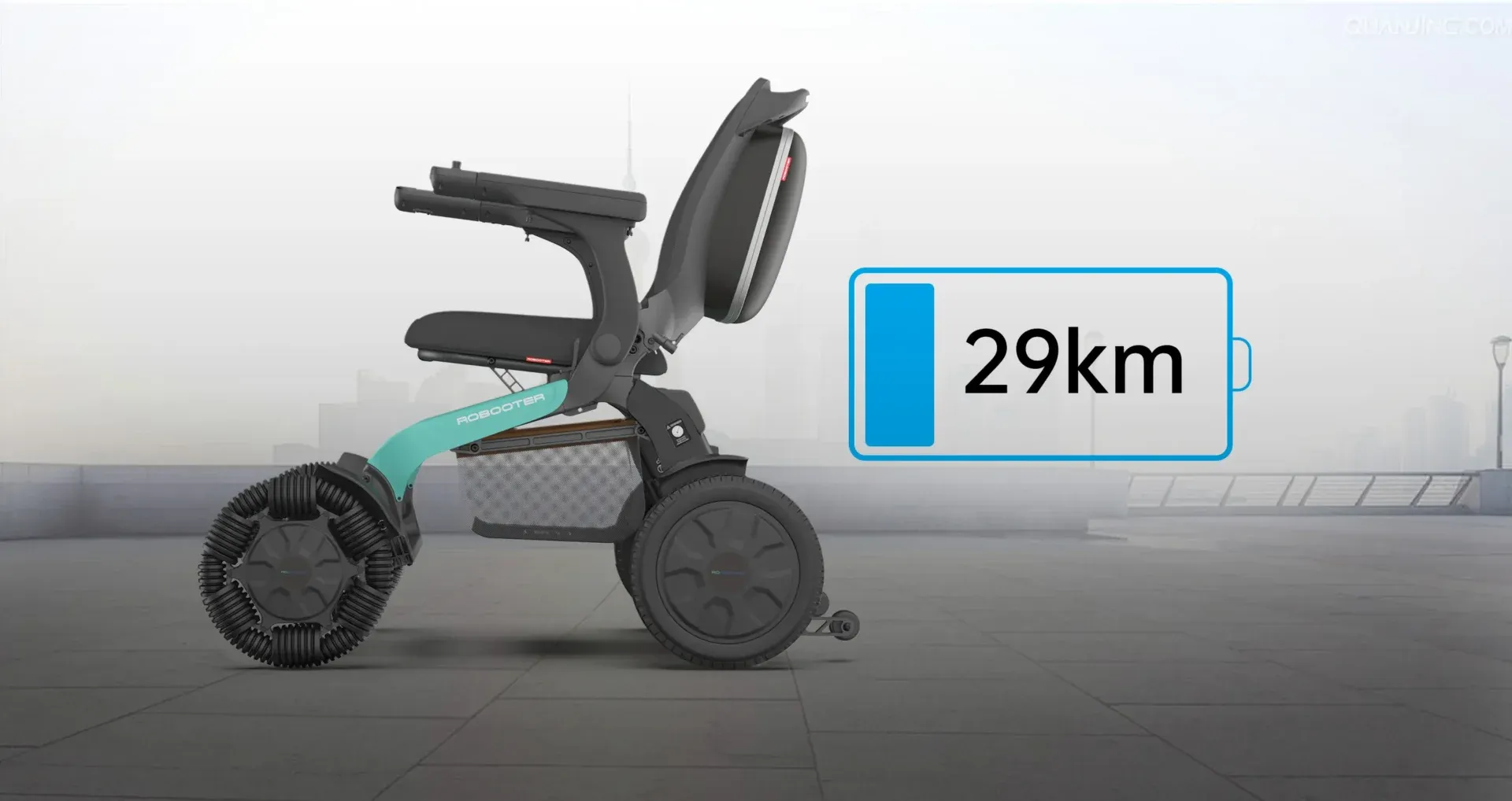 Electric wheelchair with 29 km battery range, blue accents, on an urban rooftop.
