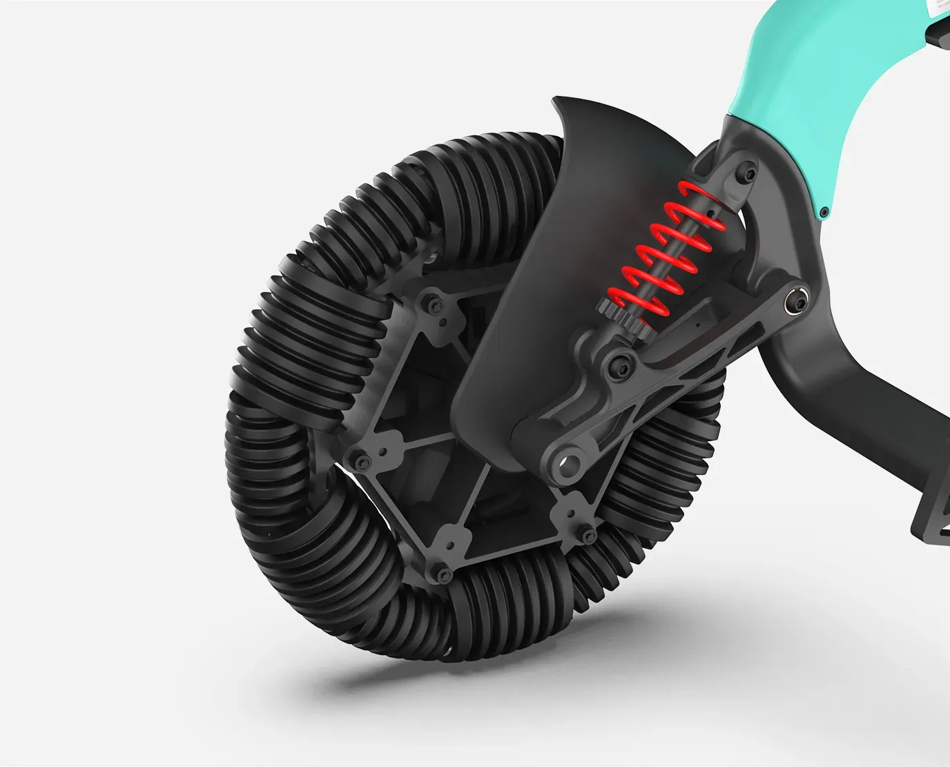 Close-up of a teal scooter wheel with a unique coiled tire design, black frame, and red spring suspension.