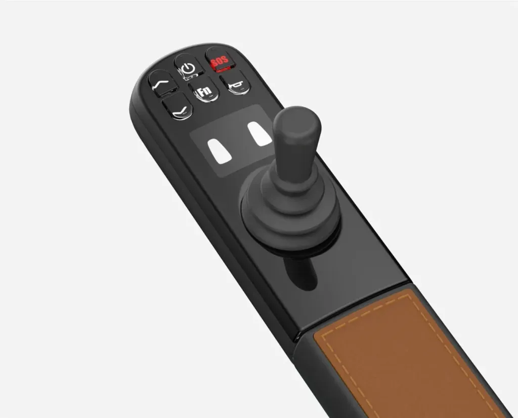 Black and brown joystick controller for a power wheelchair, with buttons and a display.