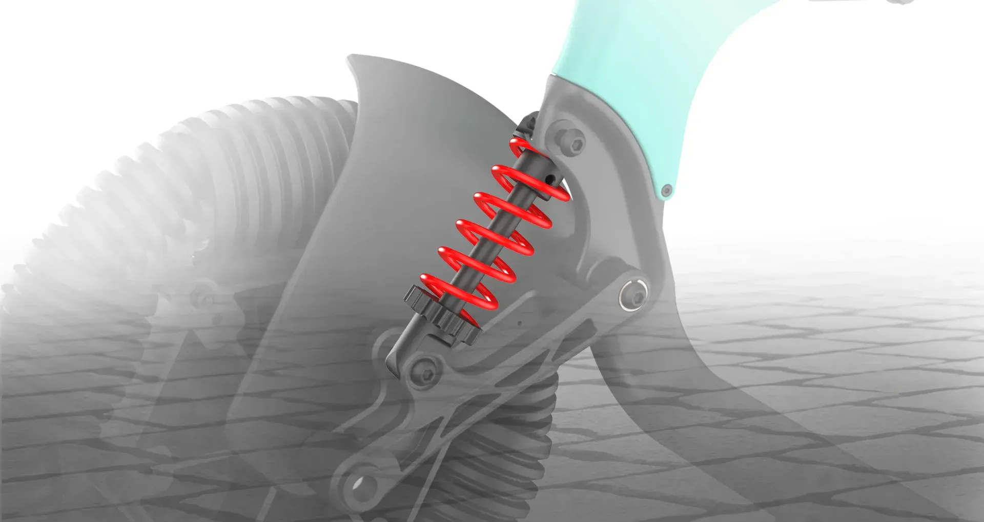 Close-up of a black, mechanical wheel assembly with a red spring for shock absorption.