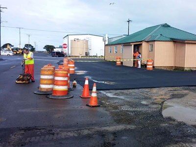 Man finishing paving work - paving services in Grayland, WA