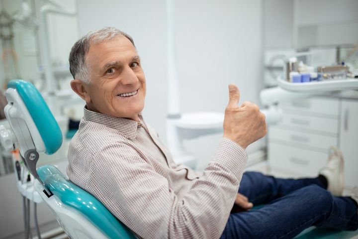 Man Sitting In A Dental Chair — Matthews, NC — Bellasera Family Dentistry