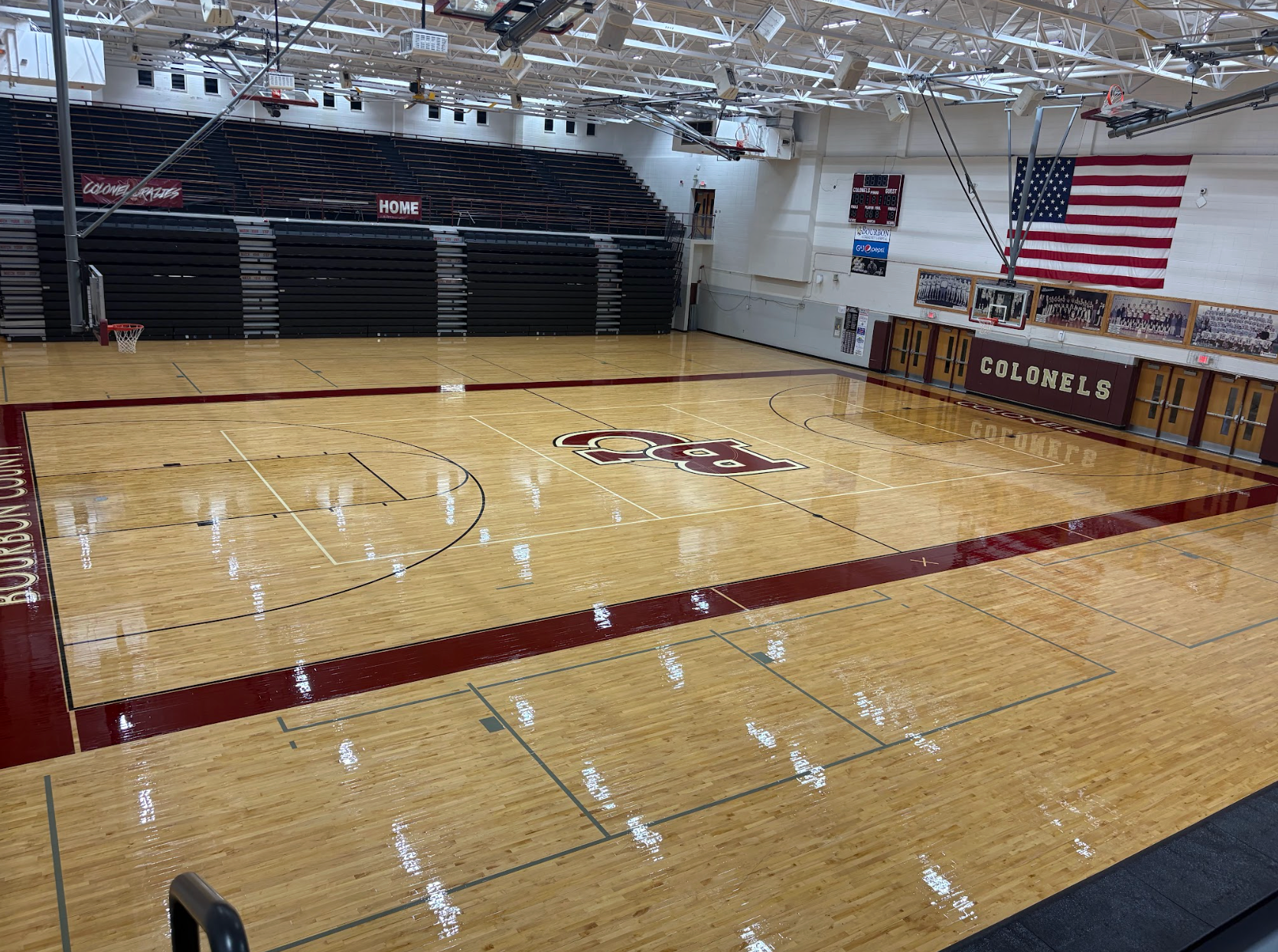 Floor sander on light wood floor.