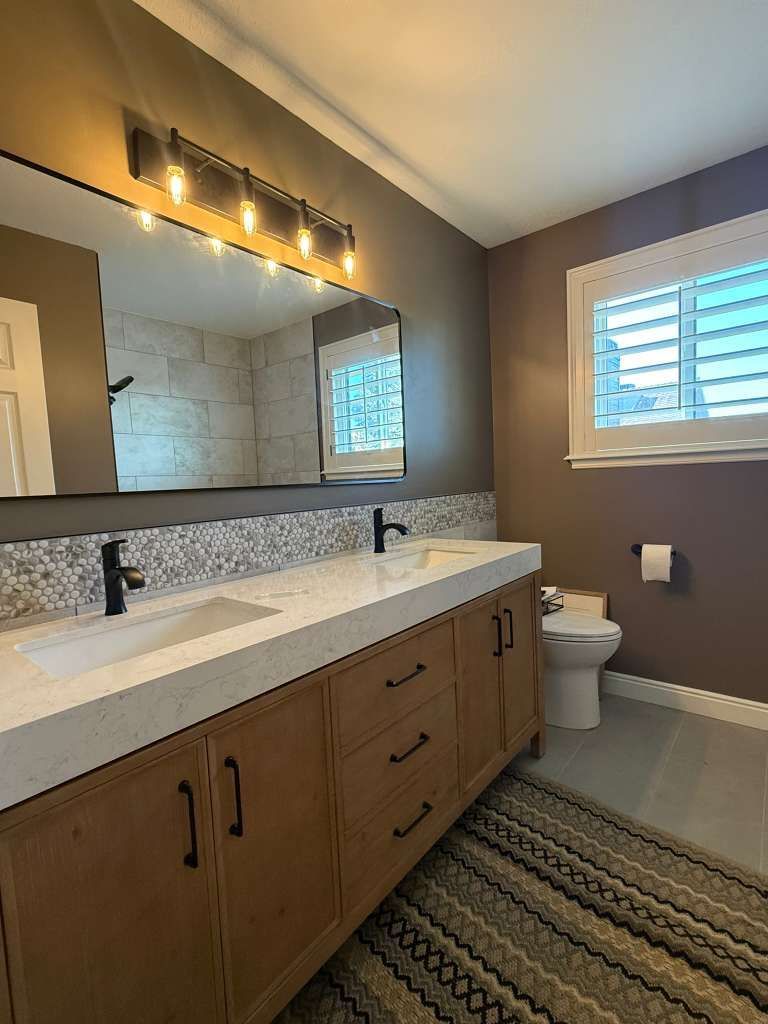 A large house with a car parked in front of it