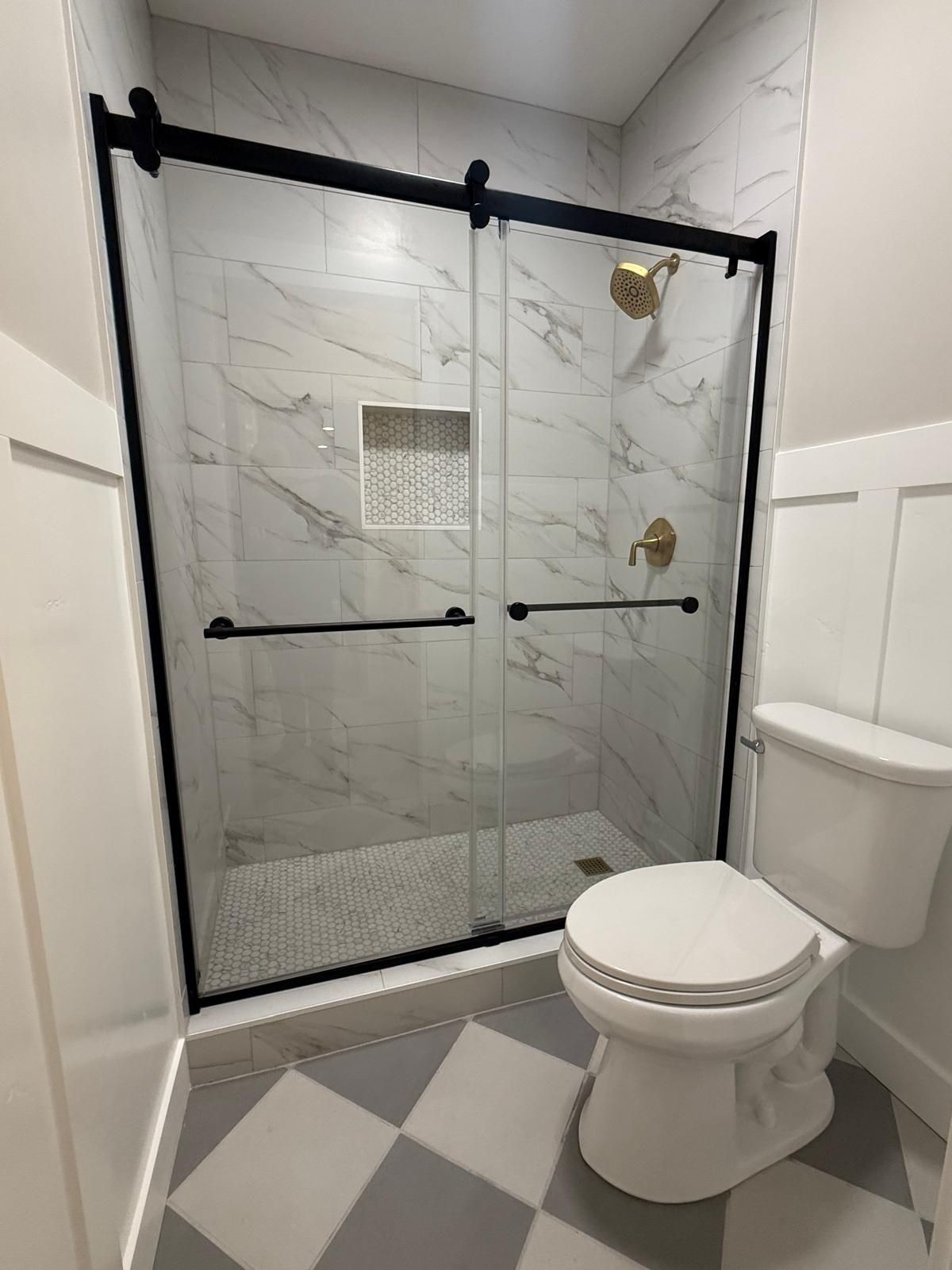 A garage with a blue floor and white walls.