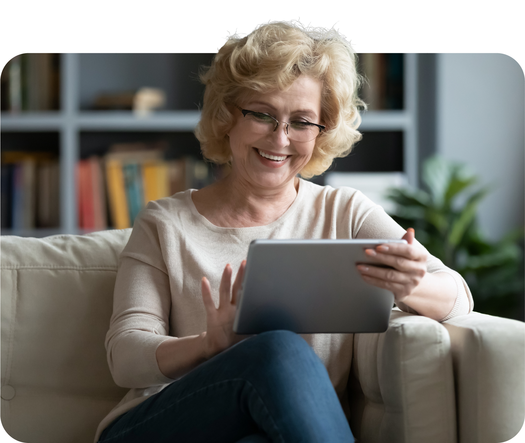 Medicare age woman enrolling on her tablet