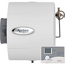 A white aprilaire humidifier with a remote control on a white background.