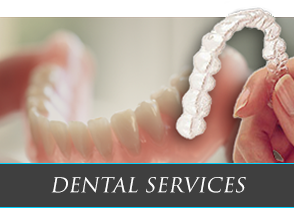 A picture of a person holding a clear retainer with the words dental services below it