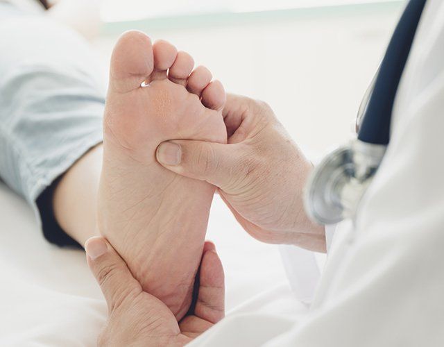 Doctor Checkup on the Client's Foot — Lake Orion, MI — Associated Foot Clinic Of Lake Orion PC