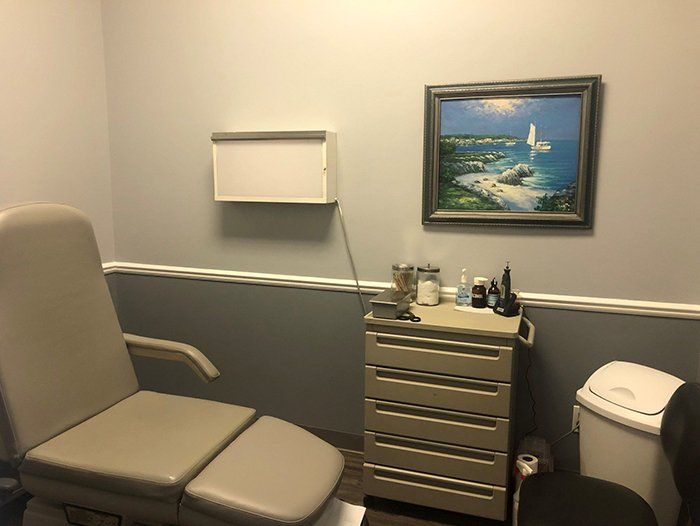 Doctor is Checking the Foot Pain — Lake Orion, MI — Associated Foot Clinic Of Lake Orion PC