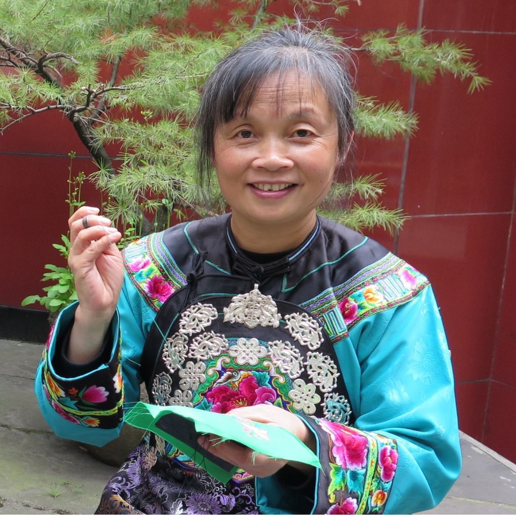 Miao embroiderer