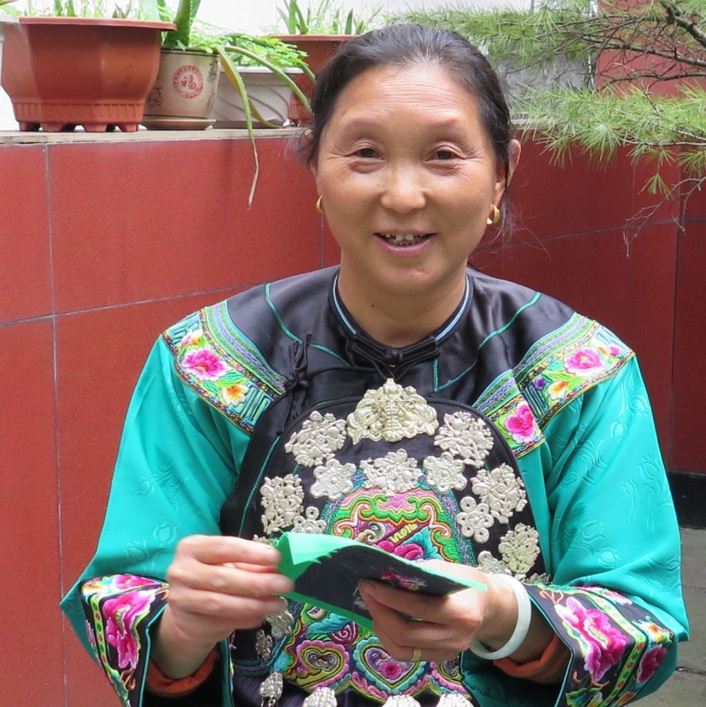 Miao embroiderer