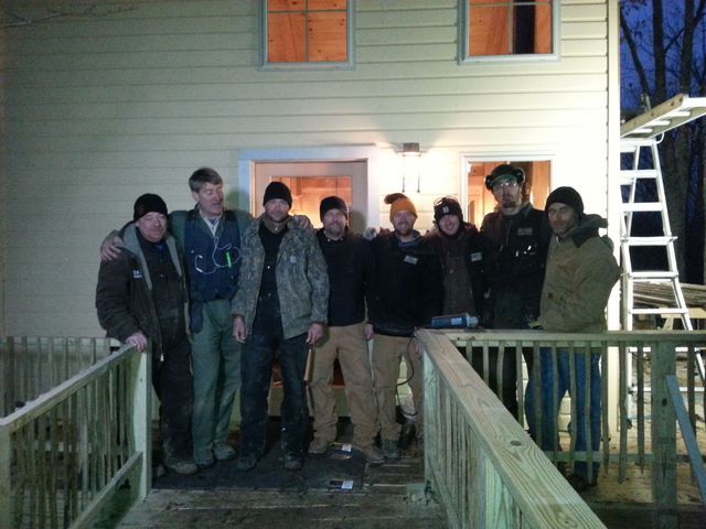 Group Of Men Outside House — Carlisle, KY — Dunn & Sons Contractors