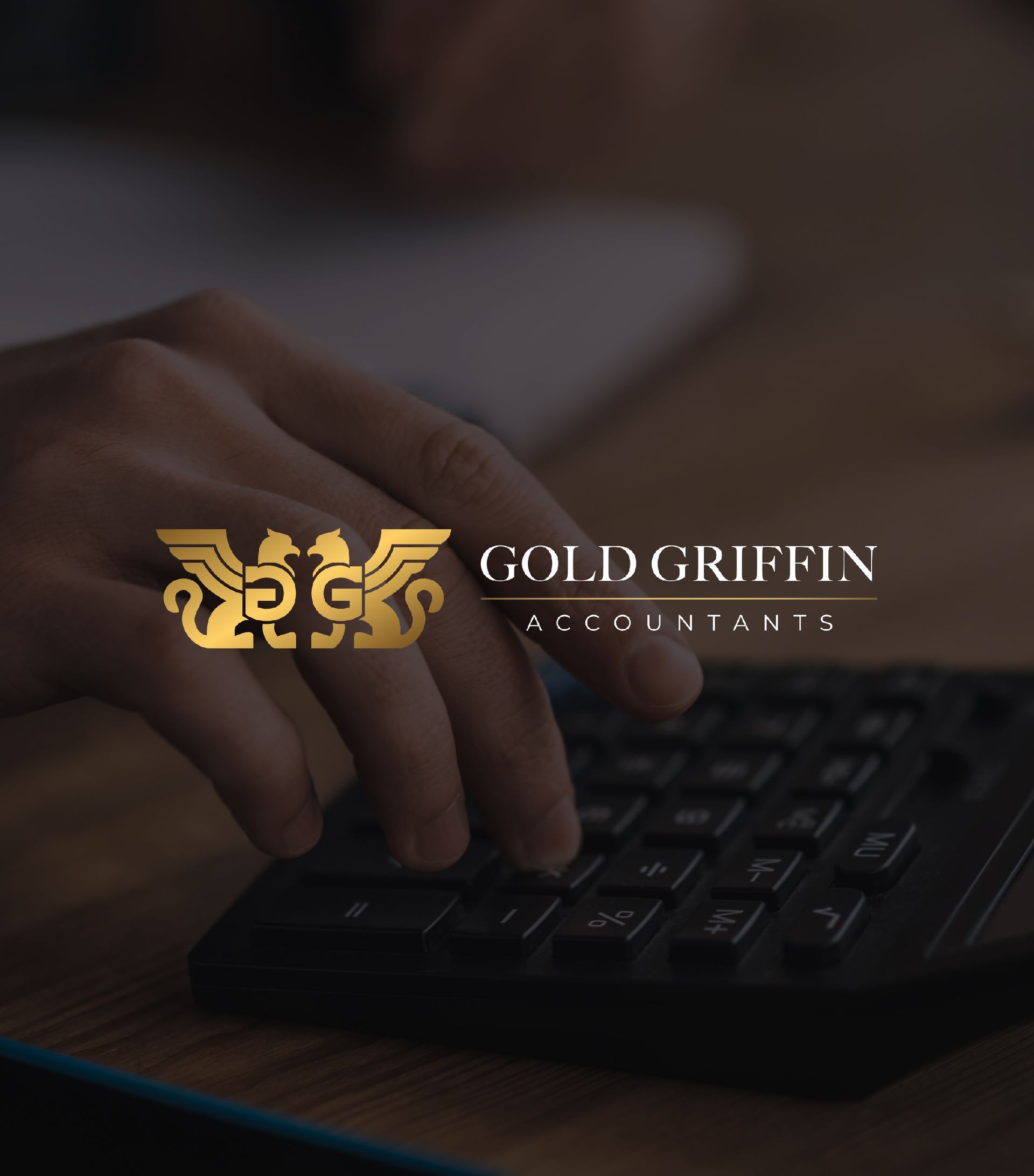A person is typing on a keyboard that says goldgriffin