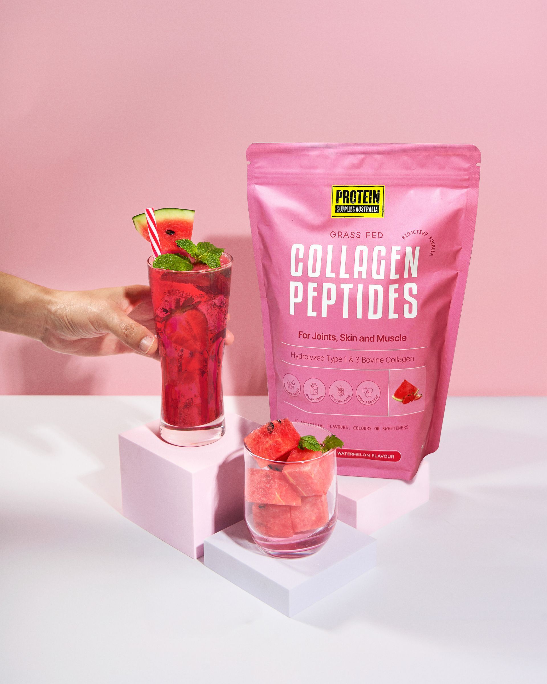 A computer , laptop , tablet and phone are sitting on a table.