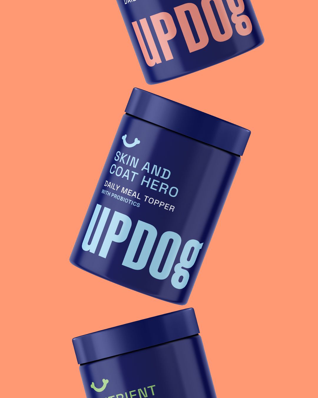 Navy blue UP DOG containers with salmon background. Labels read,