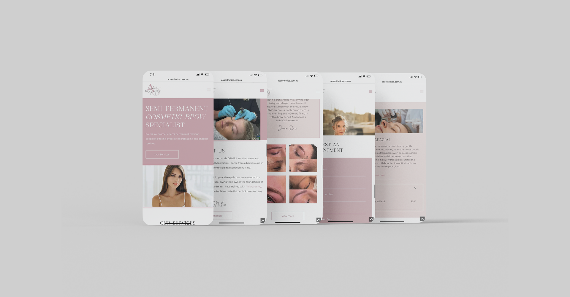 A row of cell phones sitting next to each other on a table.