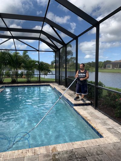 Swimming Pool Repairs — A Man Repairing Pool Mechanical System in Englewood, FL