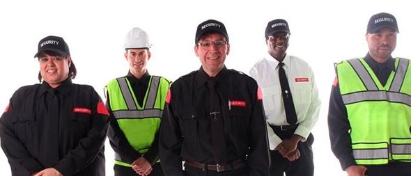 A group of security guards standing next to each other