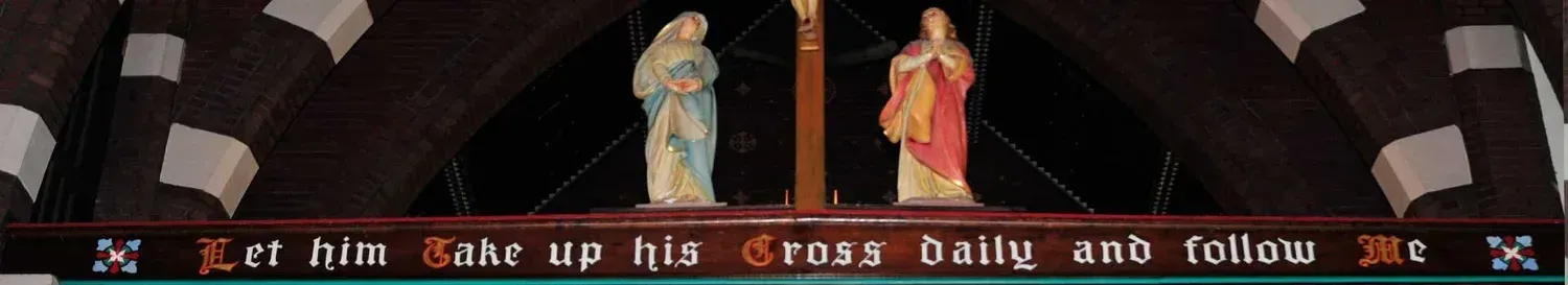 A small blue statue beside a horizontal line of tiny text on a dark background.