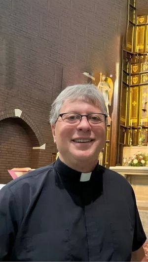 Father Daniel L. Blout