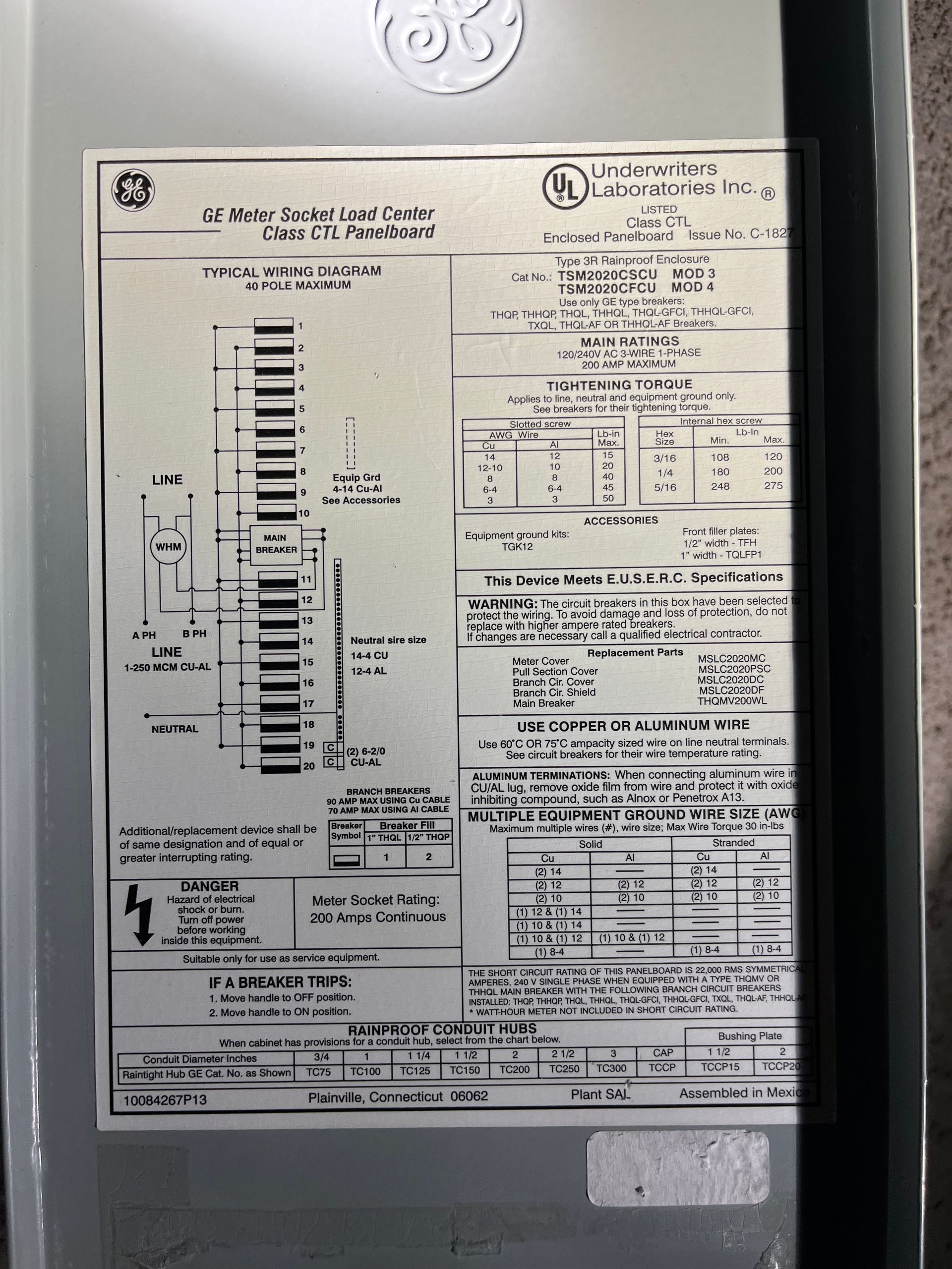 An informational technical wiring diagram label for a GE electrical load center panel.