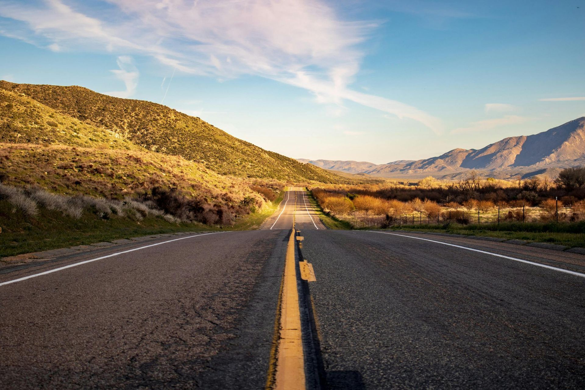Scenic open road leading to adventure—perfect for road trips with Camp in a Box camping kits