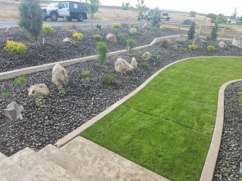 Backyard Landscaping — Landscaping with Carpet Grass Pathway in Moses Lake, WA