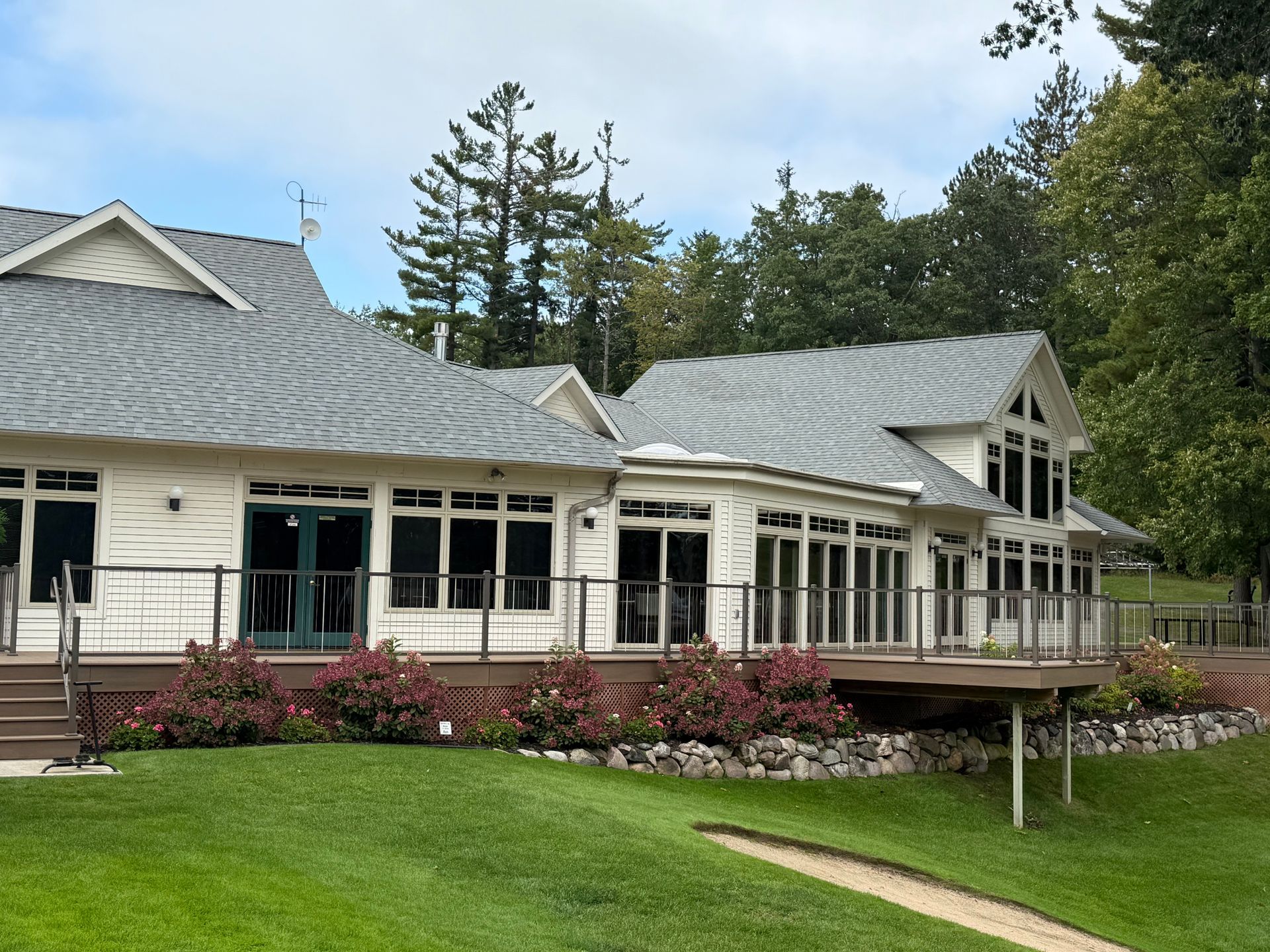 Commercial asphalt shingle installation on a golf course's clubhouse in Gaylord, MI