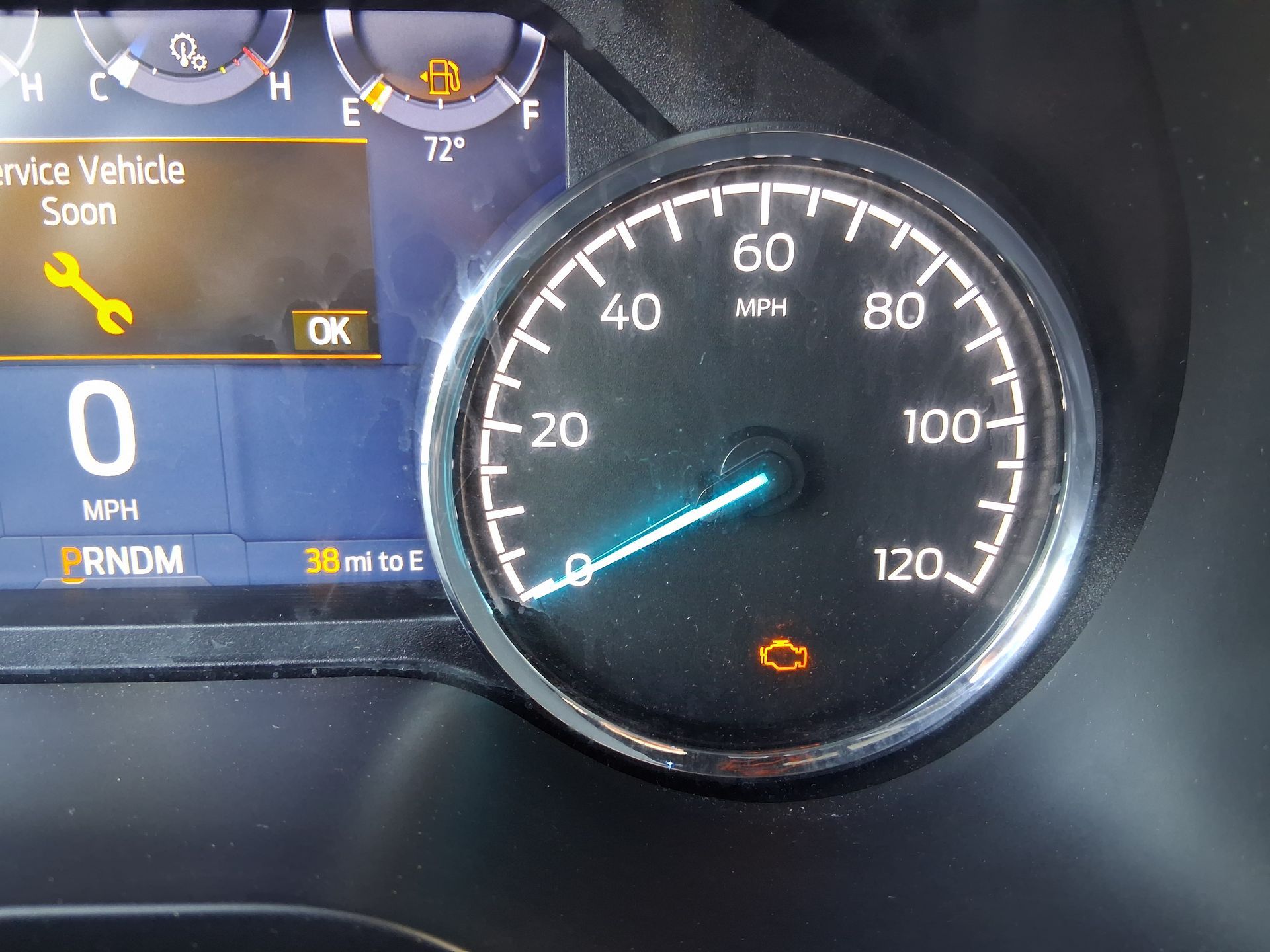 Dashboard check engine light illuminated — professional diagnostic service at Small World Automotive, Florida.