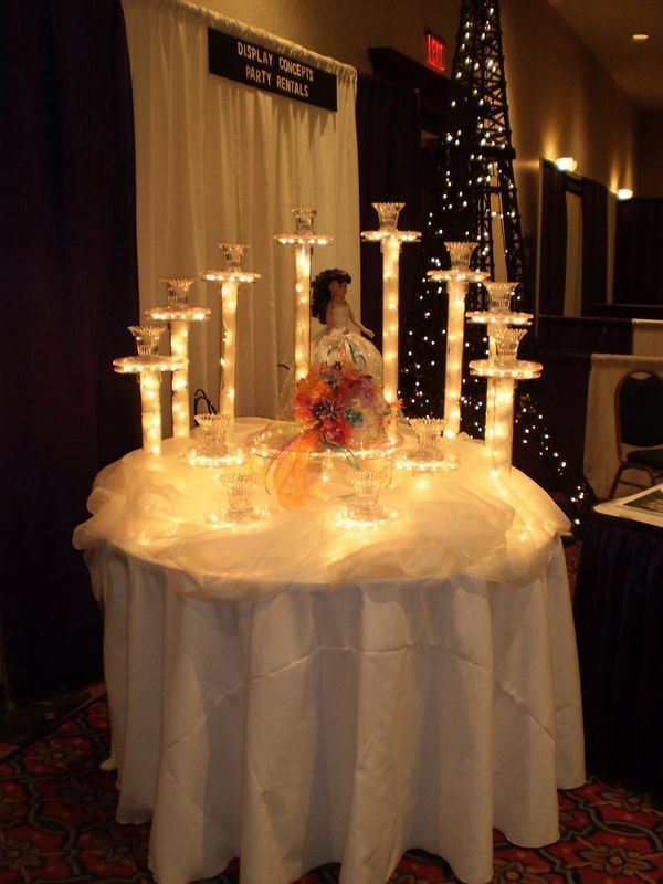A table with a sign that says girls night with roses