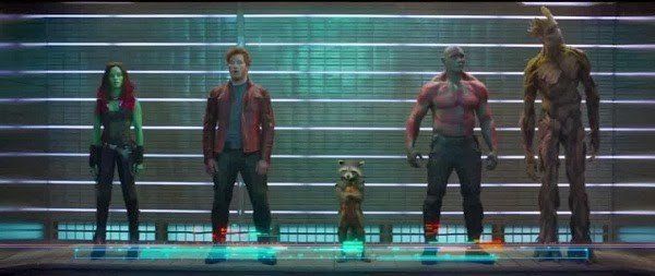 gamora, peter quil, racoon, drax, and groot in a police line up