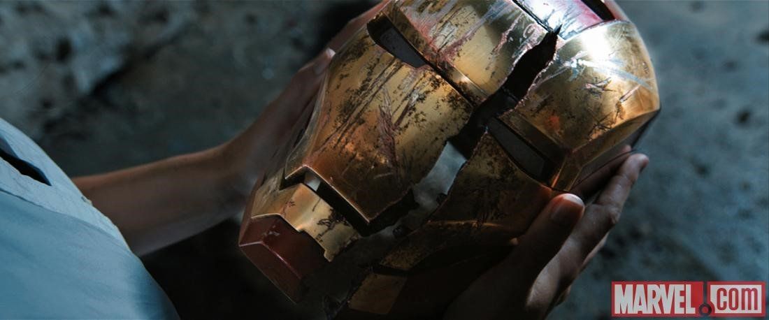 a cracked iron man helmet from the movie, iron man 3